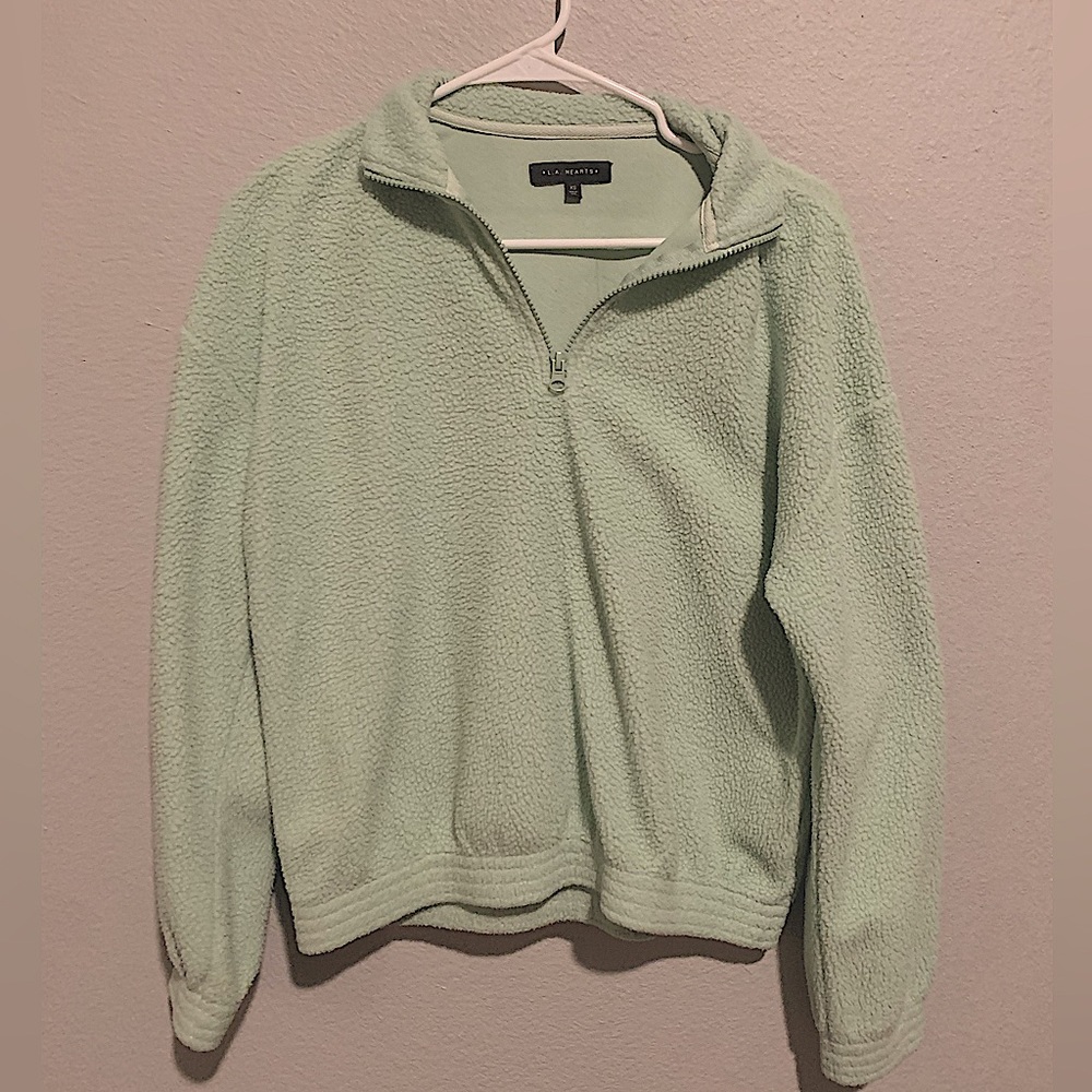 Fluffy pastel green over sized
quarter zip from pacsun
